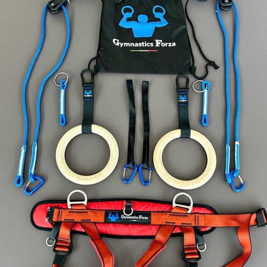 Kid training with Forza Rings — red harness